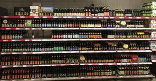 Supermarkten: minder wijn en gedistilleerd, meer bier verkocht