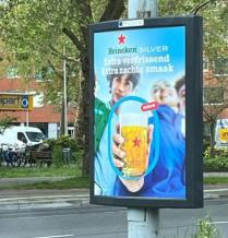 Heineken adjusts advertising posters because models look too young